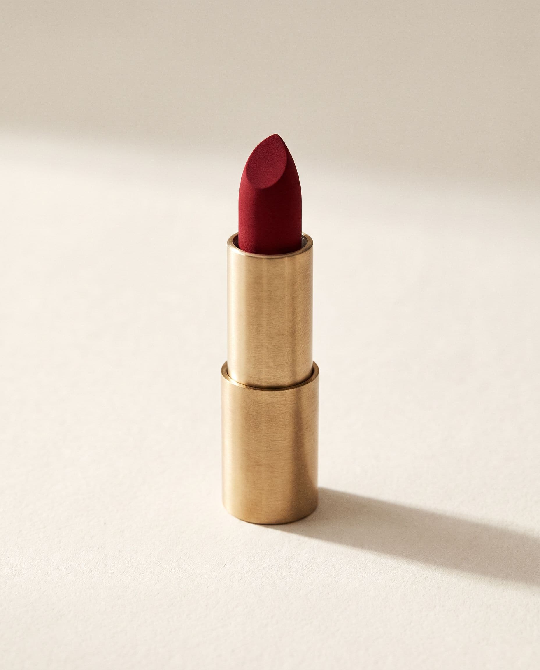 Velours — matte lipstick in deep crimson