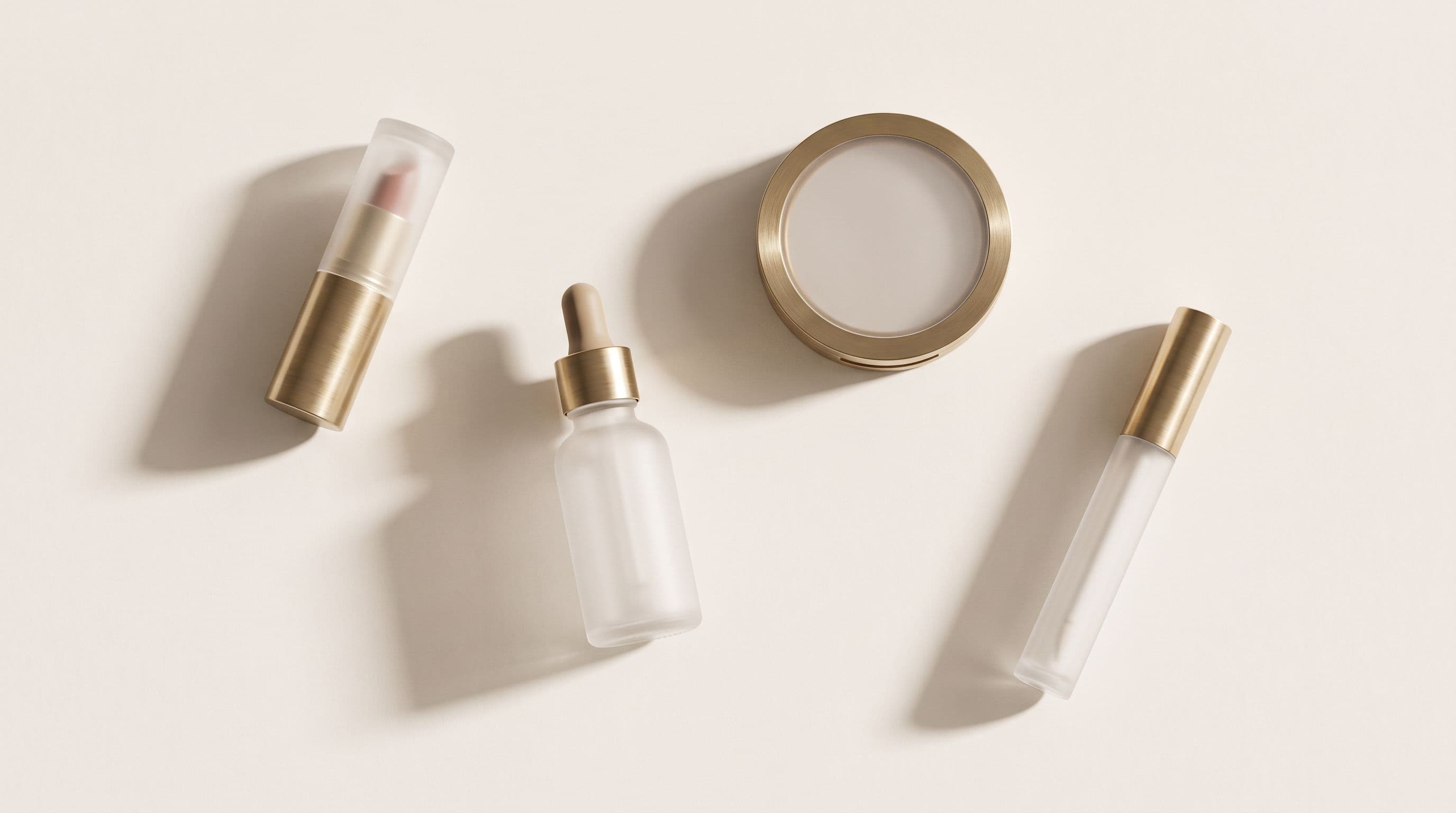 Mirevoir pieces laid out in frosted glass and brushed brass, ready to be packed.
